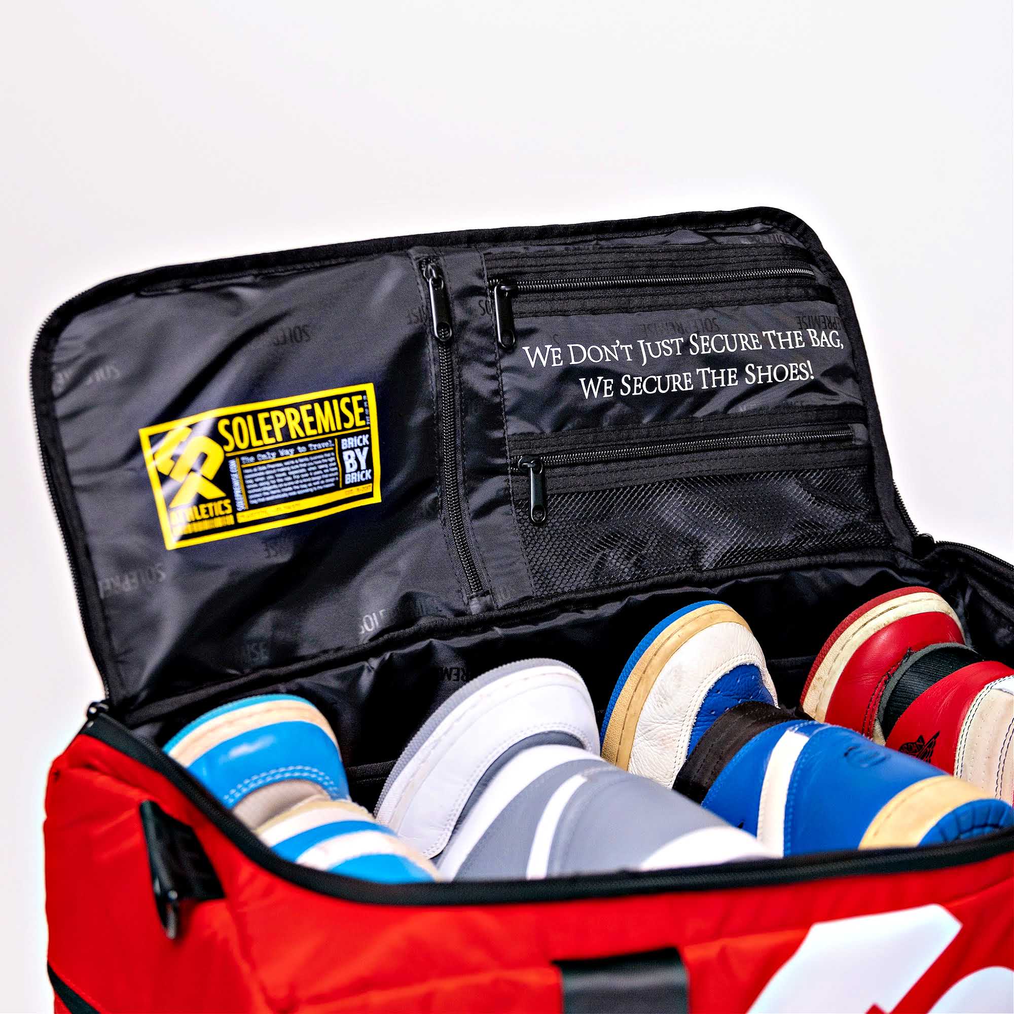 Red Sneaker Duffle Bag open Logo