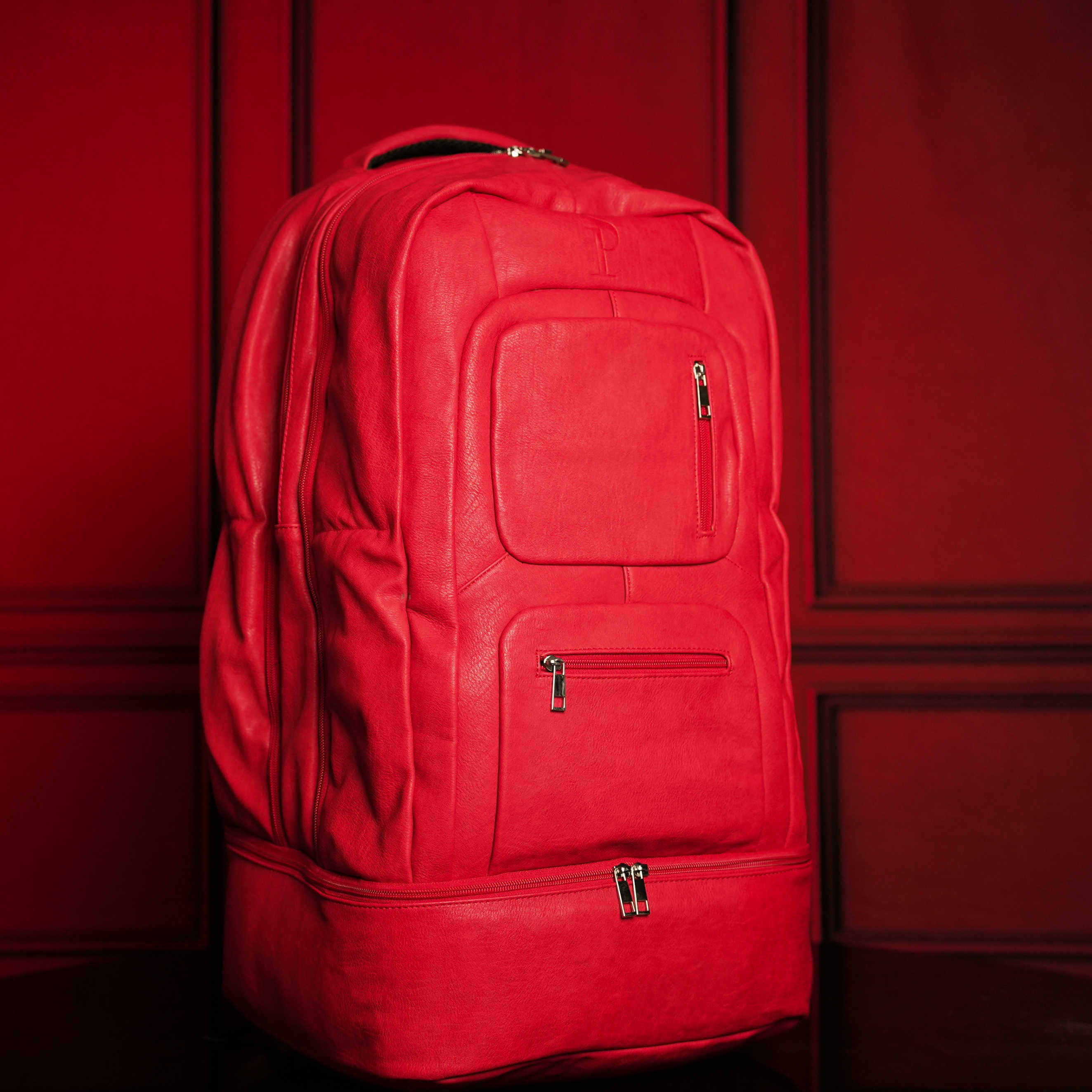 All offers leather backpack in red