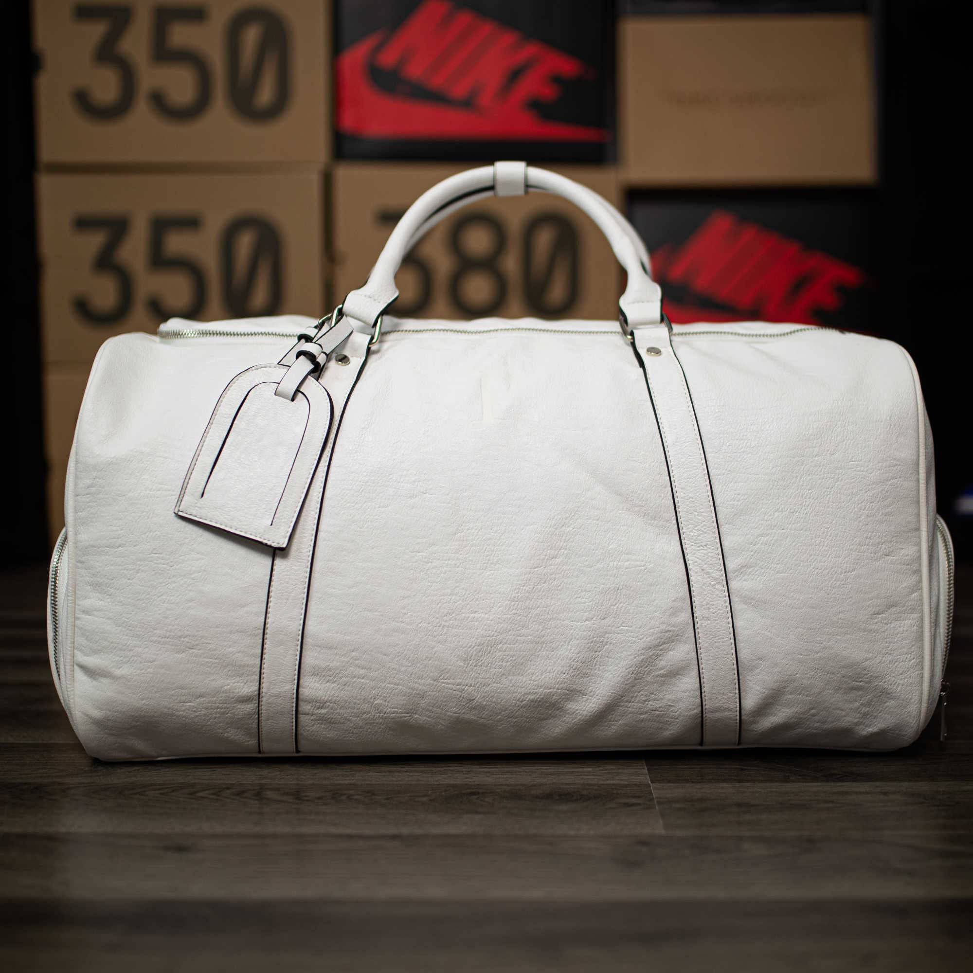 Signature duffle bag sale