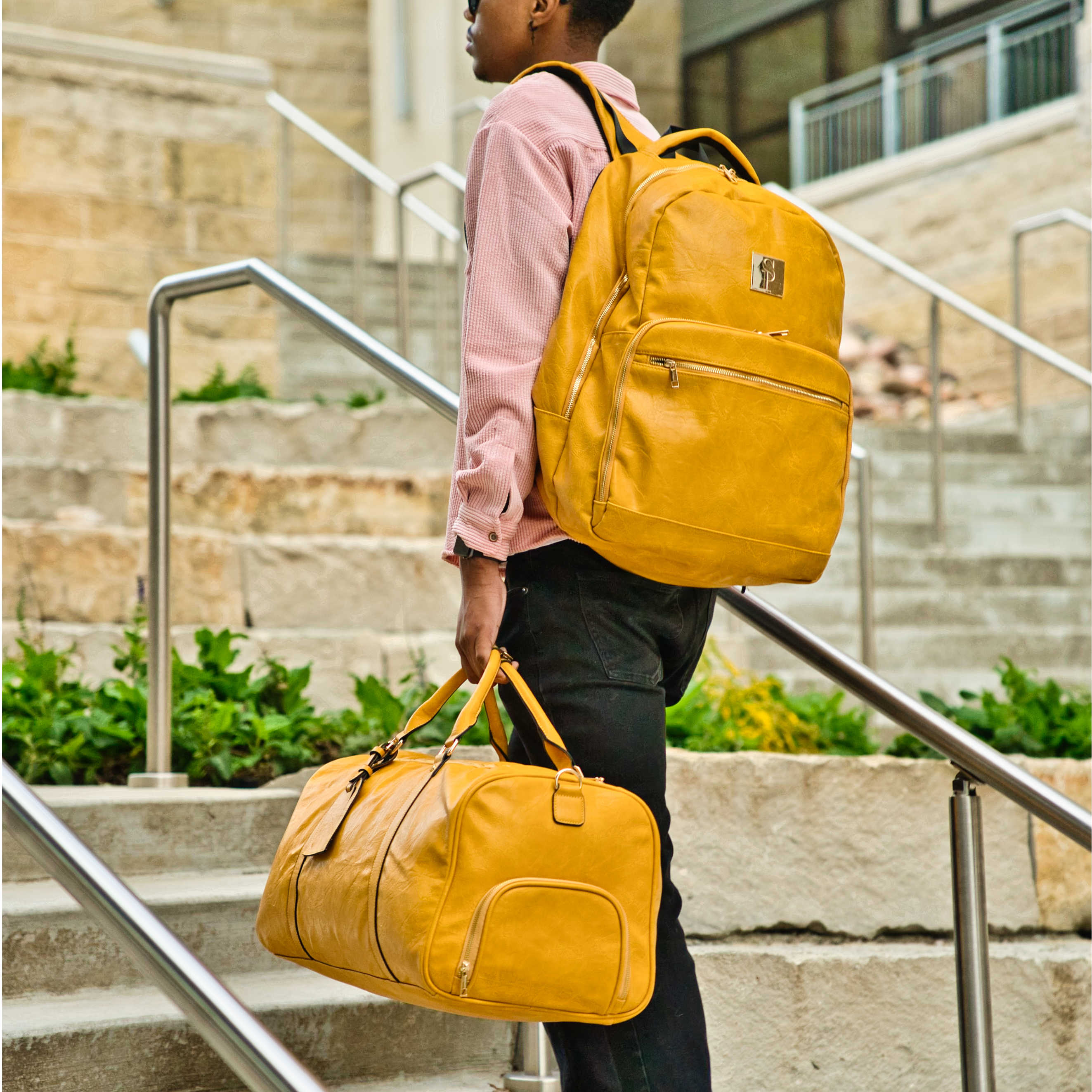 Leather backpack and shop duffle bag set