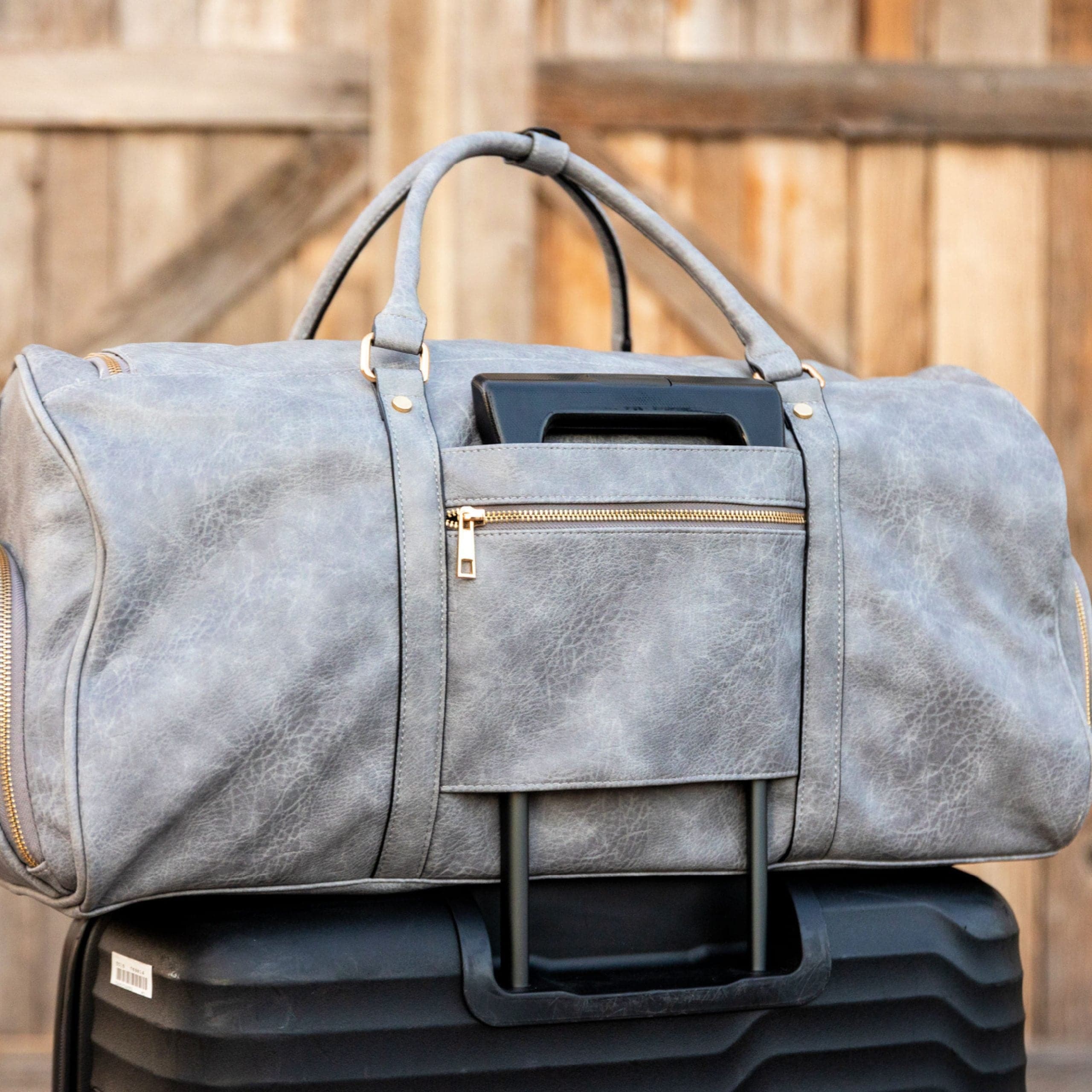 Grey leather 2024 duffle bag